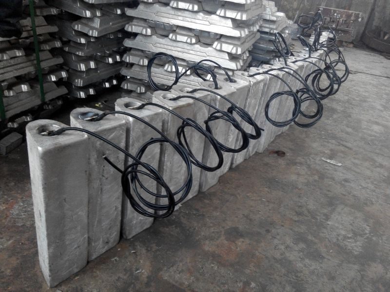 Pre-packaged D-shape magnesium anode in gypsum-bentonite backfill bag with cable for direct burial