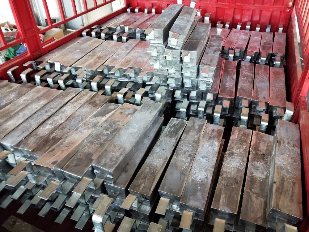 Zinc sacrificial anodes for ship hulls and marine structures