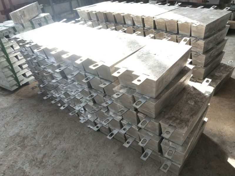Zinc block and slab anodes with steel cores for seawater structures