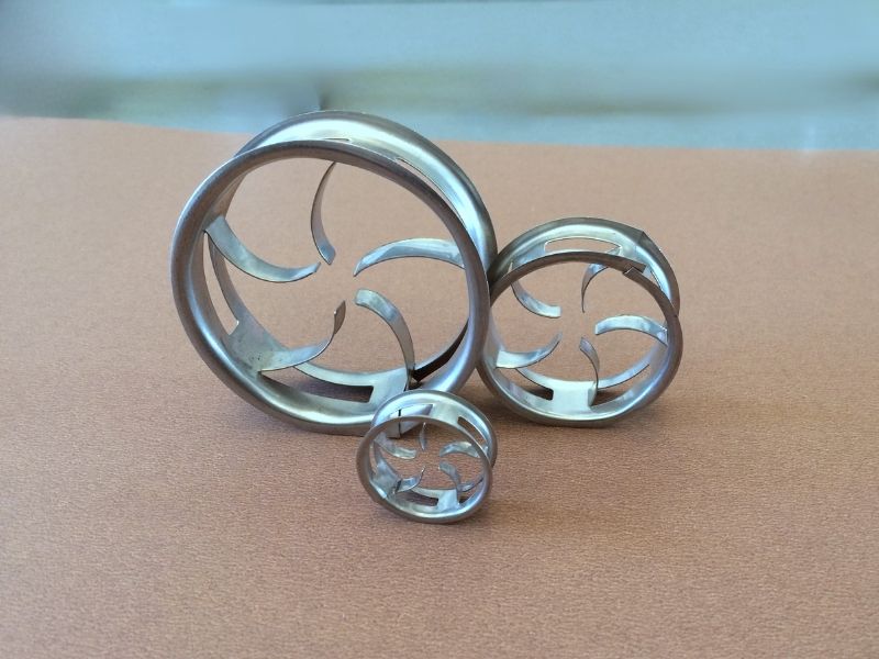 Metal Cascade Mini Ring (CMR) low aspect-ratio high-capacity random packing