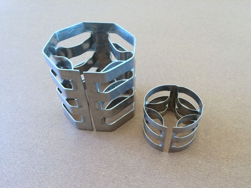Metal VSP ring high-porosity symmetric random packing for low pressure drop