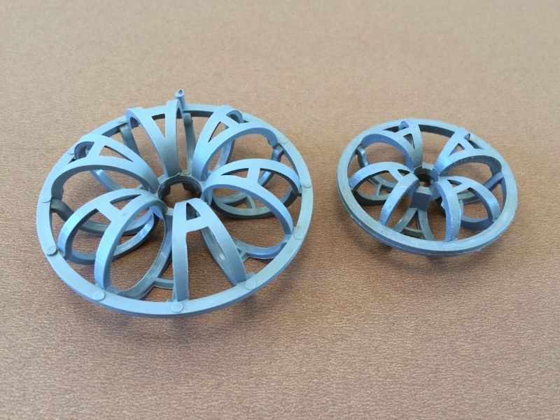 Rosette ring spiral-filament random packing in polypropylene